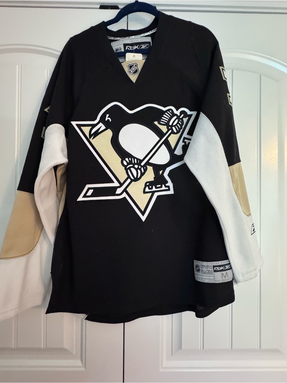 Pittsburgh Penguins Reebok Black and White NHL Reebok Jersey.